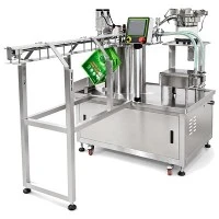 Macchina automatica per il riempimento e la tappatura di sacchetti con beccuccio a doppia testa-